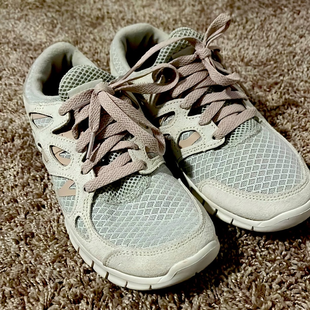 A light tan color with light pink laces. Size 7.5
